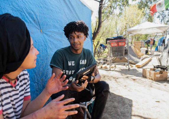 Man interviews homeless woman