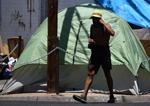 Man next to a tent