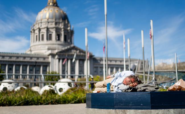 Man sleeping outside city hall